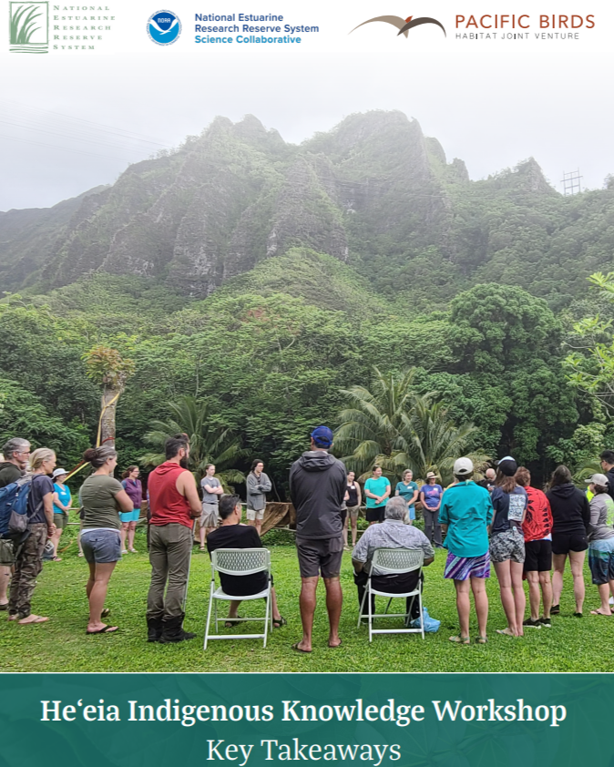 A group of people standing in a circle, with two people sitting down on foldable chairs.